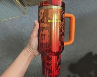 The Stanley 1913 x KAROL G 40 oz Quencher H2.O FlowState Tumbler Limited Edition