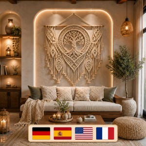 May include: A large, off-white macrame wall hanging featuring a central circular tree of life design with intricate knotting, hanging from a wooden rod. The piece includes decorative leaf-shaped accents and long, flowing fringe along the bottom edge.