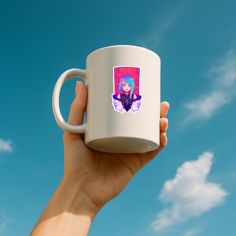 May include: A white ceramic mug featuring a colorful graphic sticker of an anime-style character with blue hair and a dark outfit. The sticker includes Japanese text in red and pink tones, set against a vibrant background with vertical lines.