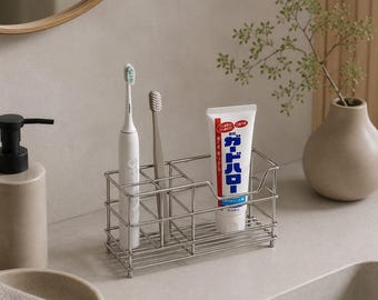 Soporte minimalista de acero inoxidable para cepillos de dientes | Almacenamiento de accesorios de baño con diseño Bauhaus