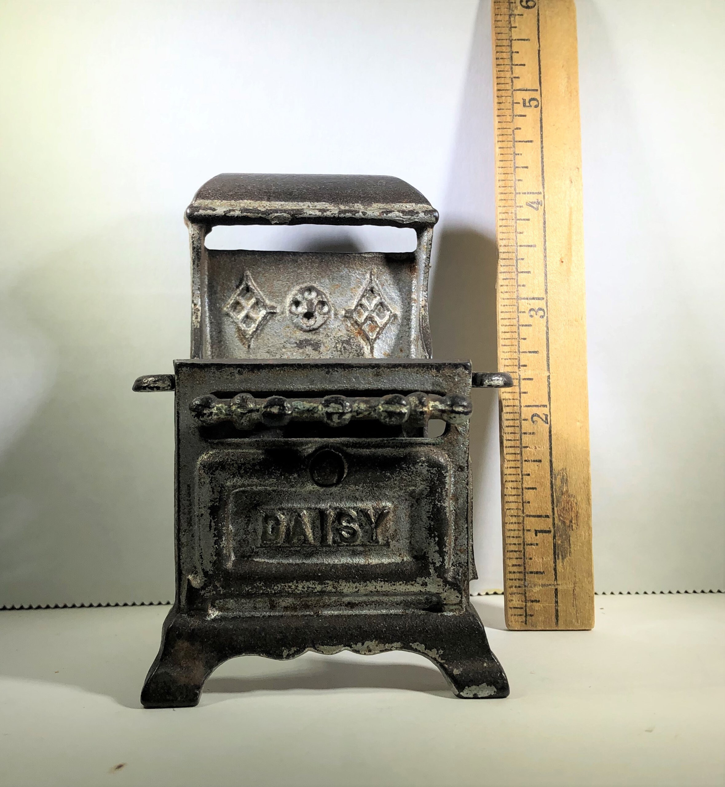Vintage Dollhouse Cast Iron Daisy Stove and Pot, 4 1/4 Inches Tall