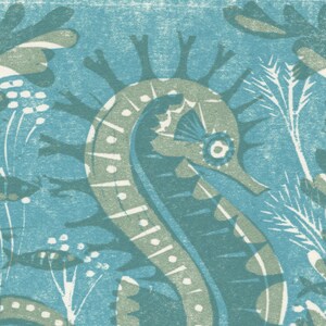 May include: A blue and green patterned illustration of a seahorse with a white background. The seahorse is surrounded by stylised seaweed and other aquatic plants.