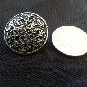 Medium Disk Broach With Celtic Griffins