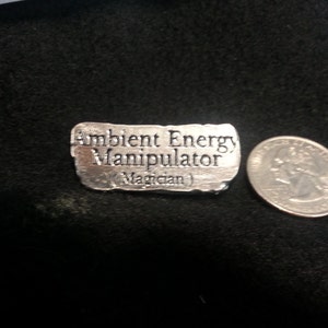 Signs Of The Thymes , A Pewter Button With Funny Sayings