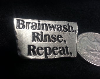 Signs Of The Thymes, a pewter Button With Funny Sayings.