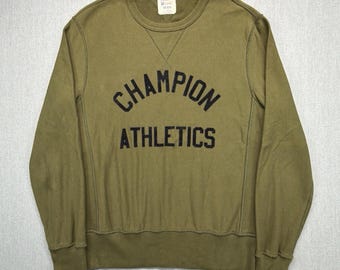 Sudadera Champion x Todd Snyder de cuello redondo, color verde oliva, fabricada en Canadá, talla M.