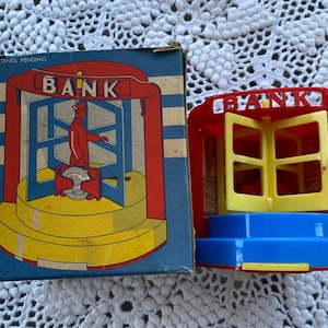 Vintage Mechanical Savings Bank