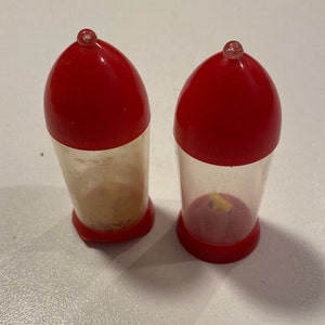 Vintage Red and Clear Rocket Shaped Plastic Salt and Pepper Shakers