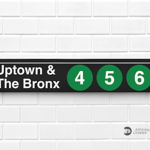 May include: Black and white sign with green circles. The sign reads "Uptown & The Bronx" with the numbers 4, 5, and 6 in the green circles.