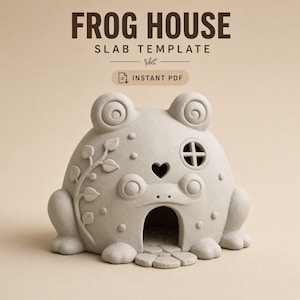 May include: A light gray ceramic frog house slab template with the text FROG HOUSE SLAB TEMPLATE and INSTANT PDF. The structure features a central arched doorway, a small circular window, a heart-shaped cutout, and embossed leaf vine details.