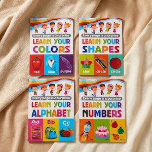 May include: Four educational children's books titled Every page is a surprise Learn Your Colours, Learn Your Shapes, Learn Your Alphabet, and Learn Your Numbers. Each book cover features colourful illustrations of children and various objects like an apple, dolphin, feather, star, sandwich, ball, abacus, backpack, peppers, rocket, cake, and ladybugs.