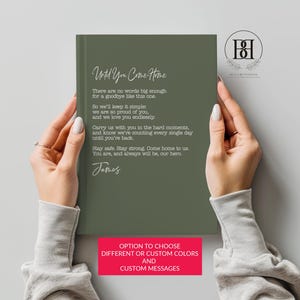 May include: A sage green hardcover book featuring white printed text that reads: Until You Come Home, There are no words big enough for a goodbye like this one. So we'll keep it simple: we are so proud of you, and we love you endlessly.