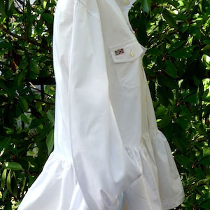 Double Pocket Re Engineered Crisp White Peplum Shirt.