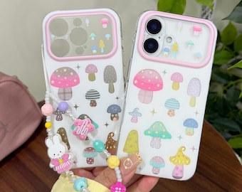 Capa para iPhone com estampa de cogumelo arco-íris, fofa e com efeito florestal. Capa resistente a impactos com cordão de coelhinho para iPhone 17/16/15 Pro Max.