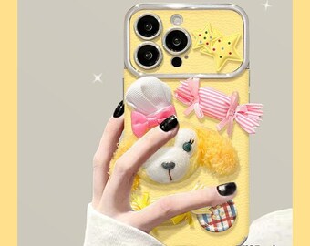 Yello CookieAnn 3D Plush Dog iPhone Case with Pom Pom Wrist Strap, Cute Disney Character Shockproof Cover for iPhone17/16/15/14/13 Pro Max