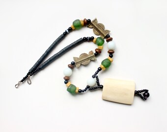 Ethnic African long beaded pendant necklace made of glass beads ,brass and bone elements