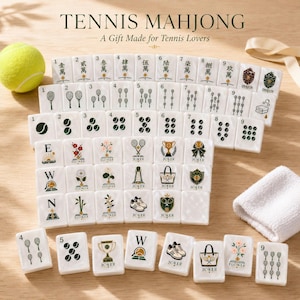 May include: A set of white Mahjong tiles featuring tennis-themed illustrations including tennis balls, rackets, trophies, sneakers, and floral designs. The tiles display numbers, Chinese characters, and the word Joker. A yellow tennis ball is included.