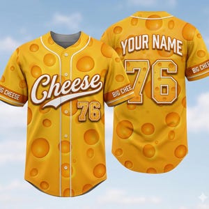 May include: A yellow baseball jersey featuring a Swiss cheese pattern with holes. The front displays the word Cheese in white script and the number 76. The back shows the text YOUR NAME and the number 76. Both sleeves feature the text BIG CHEESE.