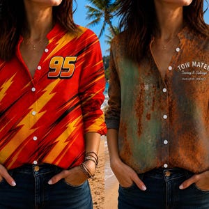 May include: A long-sleeved button-down shirt featuring two distinct designs. The left side is bright red with yellow lightning bolts and the number 95. The right side features a rusted, weathered texture with the text Tow Mater Towing & Salvage.