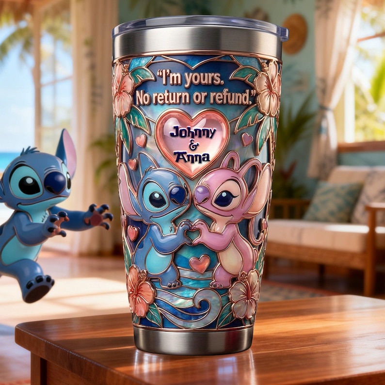 May include: A stainless steel tumbler featuring a blue and pink alien character design with hibiscus flowers and a heart graphic. The text reads, "I'm yours. No return or refund." and "Johnny & Anna" in the center. The tumbler has a clear lid.