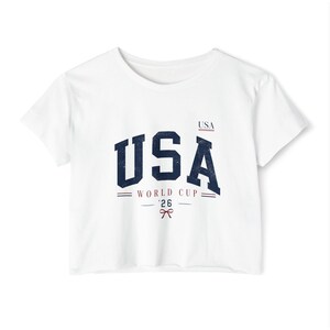 Top corto de la Copa Mundial de EE. UU. 2026, camiseta vintage desgastada para aficionados al fútbol, camiseta de mujer de la selección femenina de EE. UU. White