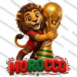 May include: A cartoon lion with a brown mane wearing a red and green soccer uniform with a star emblem, holding a large gold trophy with the text WORLD CUP. Below the lion, the word MOROCCO is written in large red and green 3D lettering.