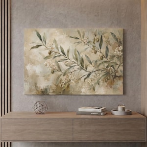 May include: A rectangular canvas wall art piece featuring an impressionistic painting of olive branches with green leaves, small olives, and white blossoms against a textured, neutral beige and cream background with visible brushstrokes.
