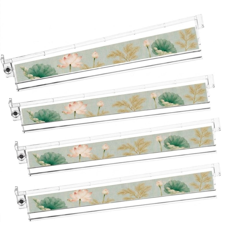 May include: Four clear plastic poster hangers, each featuring a horizontal strip of fabric with a printed pattern of pink lotus flowers, green lily pads, and golden foliage against a light blue background, designed for displaying wall art.