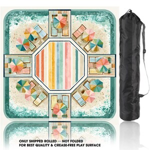 May include: A square game mat featuring a beach scene with colorful umbrellas and lounge chairs arranged around a central striped octagon, accompanied by a black cylindrical carrying bag. The text reads: ONLY SHIPPED ROLLED - NOT FOLDED FOR BEST QUALITY & CREASE-FREE PLAY SURFACE.