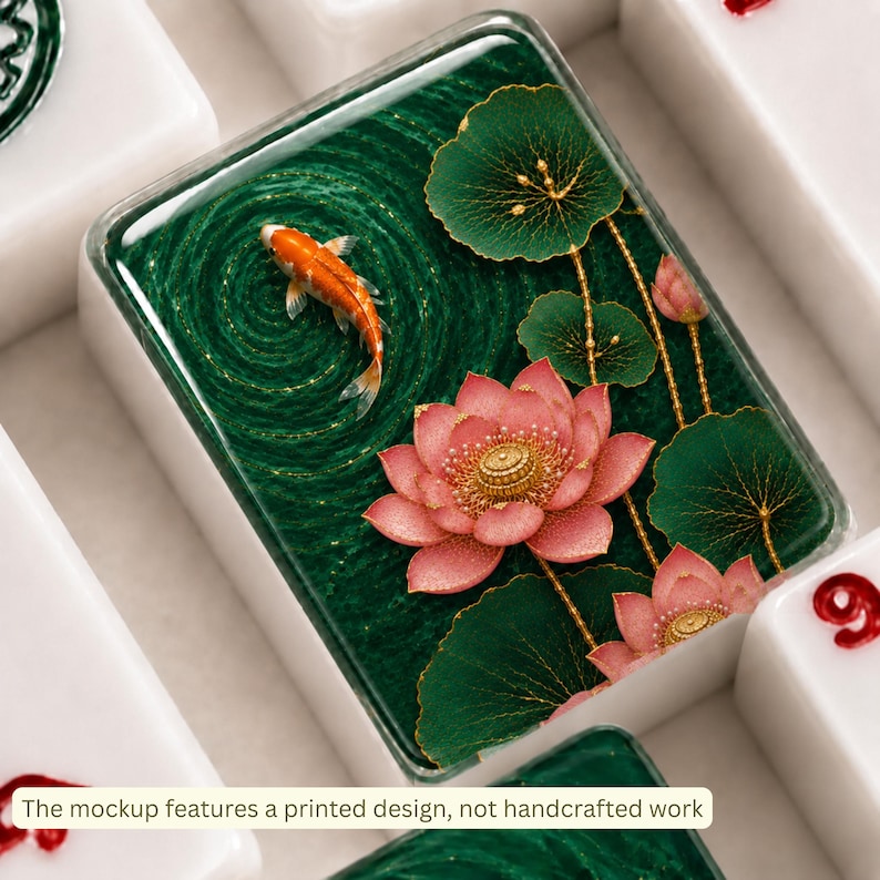 May include: A rectangular mahjong tile featuring a printed design of a single orange koi fish swimming in dark green water with pink lotus flowers and green lily pads. The text at the bottom states: The mockup features a printed design, not handcrafted work.