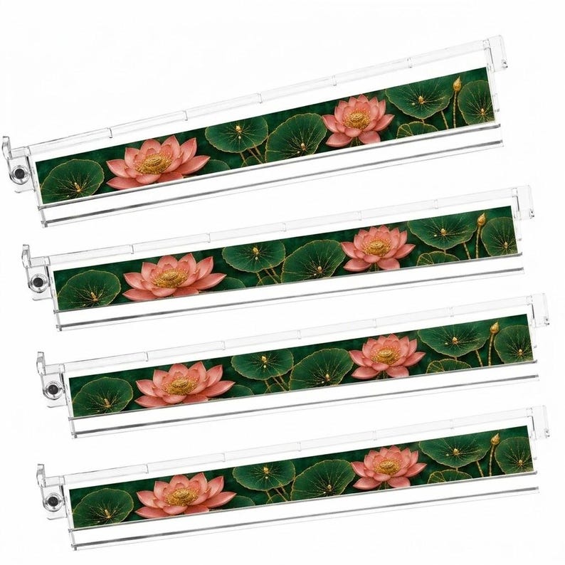 May include: A set of four rectangular hanging file folders featuring a repeating pattern of pink lotus flowers and dark green lily pads on a dark background. Each folder has a clear plastic top rail with integrated metal hooks for suspension.