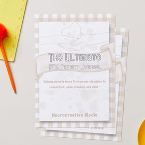 May include: A journal titled The Ultimate PDA Parent Journal with a light beige gingham border. The cover features a line drawing of hands holding a heart, the text Helping parents move from power struggles to connection, understanding, and calm, and Neurocreative Media.