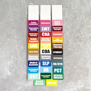 May include: A set of colorful name tags with various job titles, including Nurse Intern, Cardiac Sonographer, EMT, CNA, and more. The tags are arranged in three columns on a gray background.