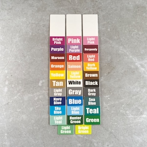 May include: A color chart with 24 different color swatches, each labeled with the color name. The colors are arranged in three columns, with the first column starting with bright pink and ending with light green, the second column starting with pink and ending with bright green, and the third column starting with light pink and ending with green.