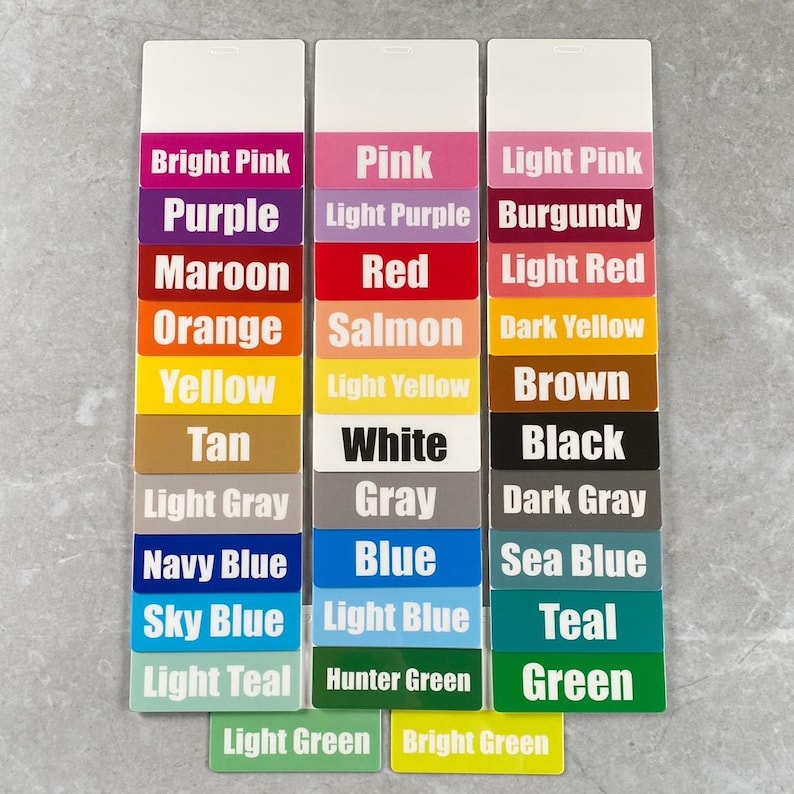 May include: A color chart with 24 different color swatches. The colors are arranged in three columns, with eight colors in each column. The colors include bright pink, purple, maroon, orange, yellow, tan, light gray, navy blue, sky blue, light teal, light green, pink, light purple, burgundy, light red, salmon, dark yellow, brown, white, gray, dark gray, blue, sea blue, teal, hunter green, and green.