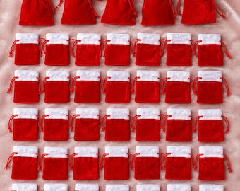 24 rote Samt-Weihnachtsmannsäcke Mini Kordelzug Geschenkbeutel Partybevorzugung Tischgeschenke