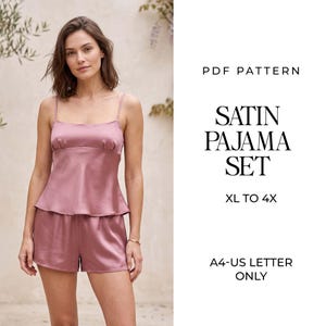 May include: A dusty rose satin pajama set consisting of a camisole with thin straps and matching shorts. The text reads: PDF PATTERN SATIN PAJAMA SET XL TO 4X A4-US LETTER ONLY. The garment features a smooth, reflective finish and a simple cut.
