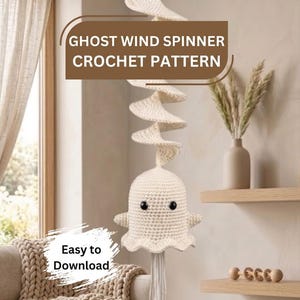 May include: A cream-colored crocheted ghost wind spinner with a spiral top and black bead eyes. The text GHOST WIND SPINNER CROCHET PATTERN is displayed in a brown box at the top, and the text Easy to Download is in a white brush stroke graphic.