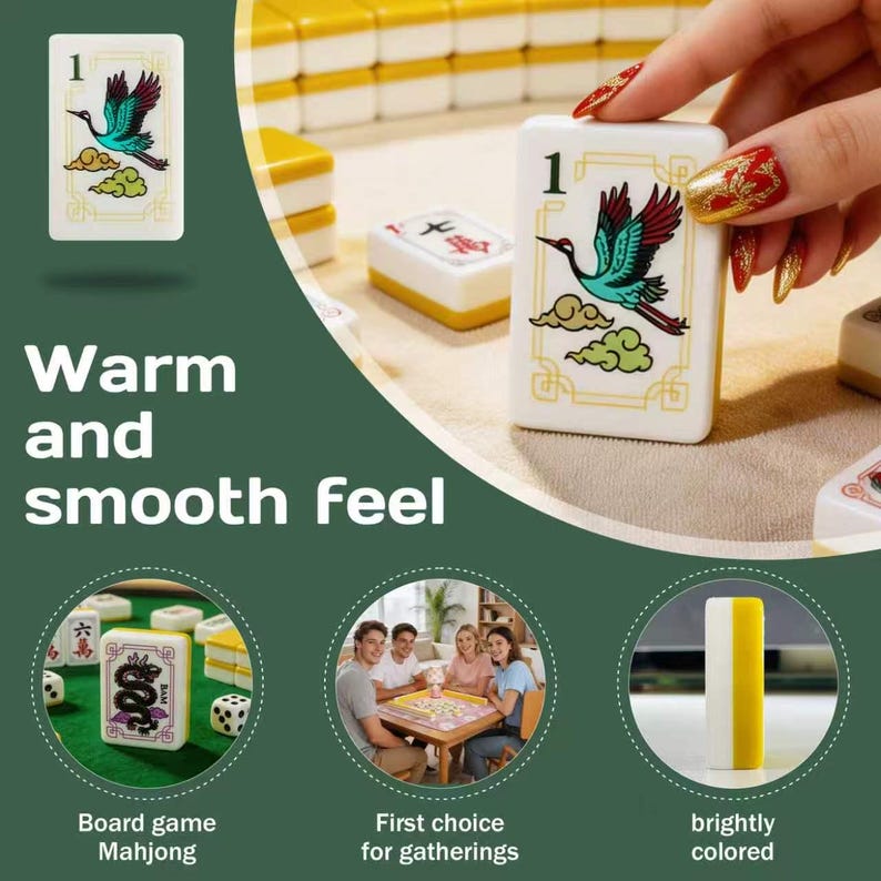 May include: A white mahjong tile featuring a green and red crane illustration with the number one in the corner. The set includes multiple rectangular tiles with various symbols, a green felt playing surface, and a yellow and white side profile.
