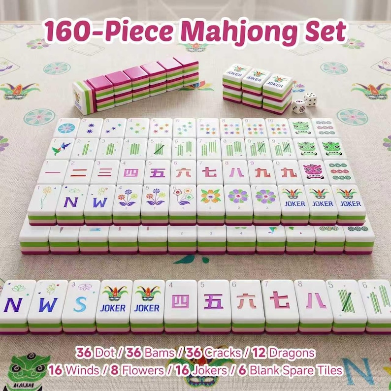 May include: A 160-piece Mahjong set featuring white tiles with green, pink, and blue designs, including numbers, symbols, flowers, and Joker tiles. The set includes two small white dice and is arranged in rows on a patterned fabric surface.