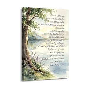 May include: A rectangular canvas wall art piece featuring a watercolour landscape of a tree by a lake with purple flowers at the base. The text of Psalm 1:1-3 is printed in black script over the water and sky, detailing the verses about the blessed man.