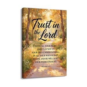 May include: A rectangular canvas wall art piece featuring an impressionistic forest path scene in warm yellow and orange tones. The text reads: Trust in the Lord with all your heart and lean not on your own understanding; in all your ways submit to him, and he will make your paths straight. Proverbs 3:5-6.
