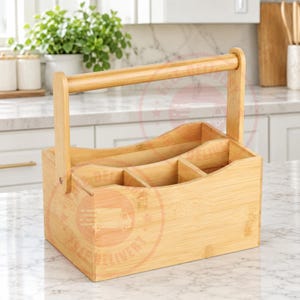 May include: A light brown bamboo caddy featuring a rectangular base with four internal compartments and a tall, arched handle. The organiser has a smooth, natural wood grain finish and a curved top edge design, providing a structured storage solution.