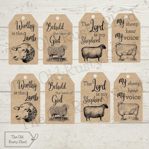 May include: A collection of eight brown paper tags with religious text and illustrations of sheep. Each tag features a different phrase, including "Worthy is the Lamb" and "The Lord is my Shepherd."