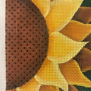 May include: Close-up of a sunflower with brown and yellow petals. The centre of the sunflower is brown and textured.