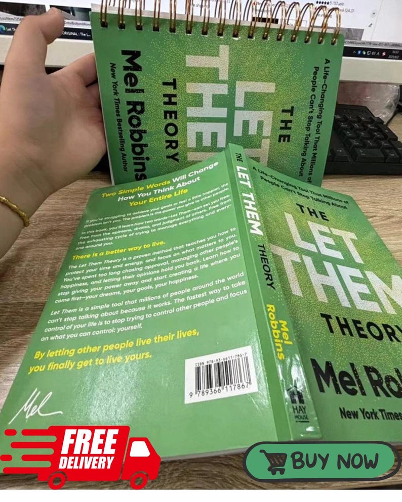 May include: A spiral-bound book titled The Let Them Theory by Mel Robbins with a bright green cover. The back cover features descriptive text about the book's content, a barcode, and the author's signature in white against the green background.