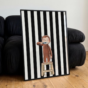 May include: A framed rectangular wall art print featuring a brown monkey standing on a light-colored wooden stool while brushing its teeth with a blue toothbrush. The background consists of vertical black and white stripes in a clean, bold pattern.