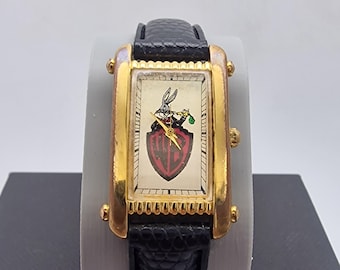 A Vintage 1990s Warner Bros. Bugs Bunny Gold Tank Watch, black leather strap