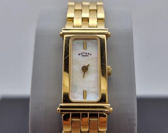 Vintage ladies ROTARY  quartz dress watch. Tank style gold tone case with a mother of pear dial.