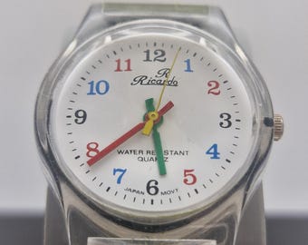 Vintage Ricardo clear cased quartz 90' stylish watch, pastel green strap